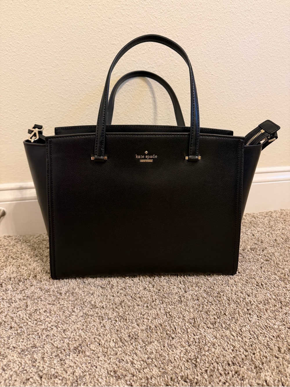 kate spade black leather satchel with gold-tone accents